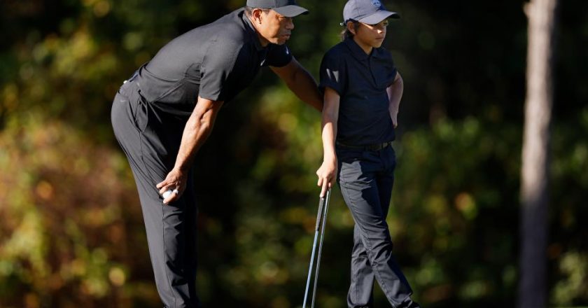 Tiger makes pro-am walk ahead of title hunt with son Charlie